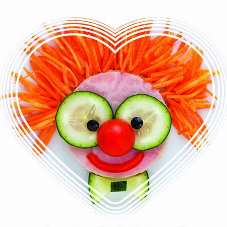 פרצוף מחייך מירקות חתוכים. לצמבז - לצמצם בזבוז מזון